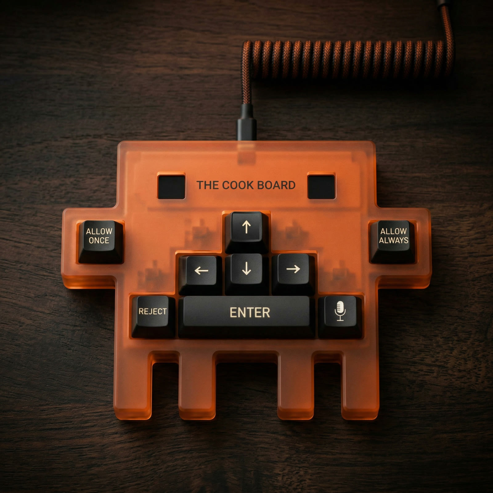 The Cook Board — 8-key macro keyboard with translucent amber case, Space Invader design
